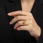 Rose ring with black tailored suit